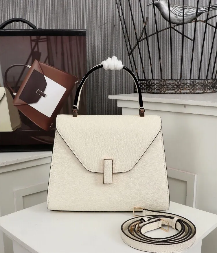 In stock👉Original small size off-white👉Valextra Valextra Iside, known as Italian Hermès, is one of Valextra's most representative designs. There is no obvious logo, but the simple collective line design is very recognizable, full of architectural art, and shows a capable and intellectual style. It is made of imported palm-print lining cowhide, with up to five stitches of handwork, and the shiny oil edges test the skill of the craftsman. Small size: 22Cm